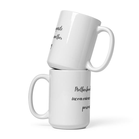 Motherhood is the exquisite inconvenience of being another person's everything. Ceramic Mug